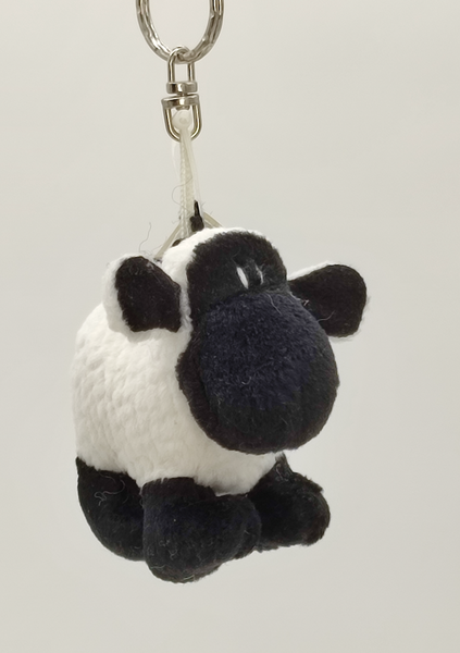 Schlüsselanhänger Sheepworld "Sisqo", Material: Plüsch, Farbe: weiß-schwarz, Maße: 9 x 7 cm, aus der Nici-Kollektion